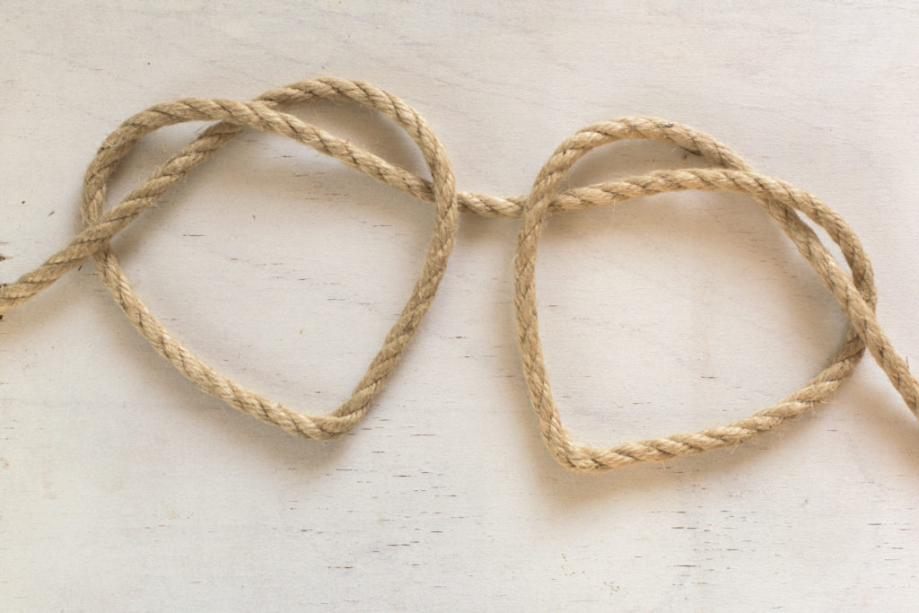 Two heart ropes connected to a knot on white wood for relationship counseling in florida. Online marriage counseling in florida is available at me therapy with Emy and other online therapists in florida