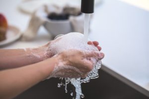 Washing hands. Post-Covid anxiety makes anxiety treatment in St. Pete even more important. Find a St. Petersburg, FL therapist for online therapy in Florida here.